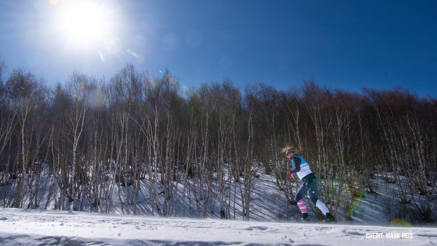 Sydney Peterson cross-country skiing at a competition.