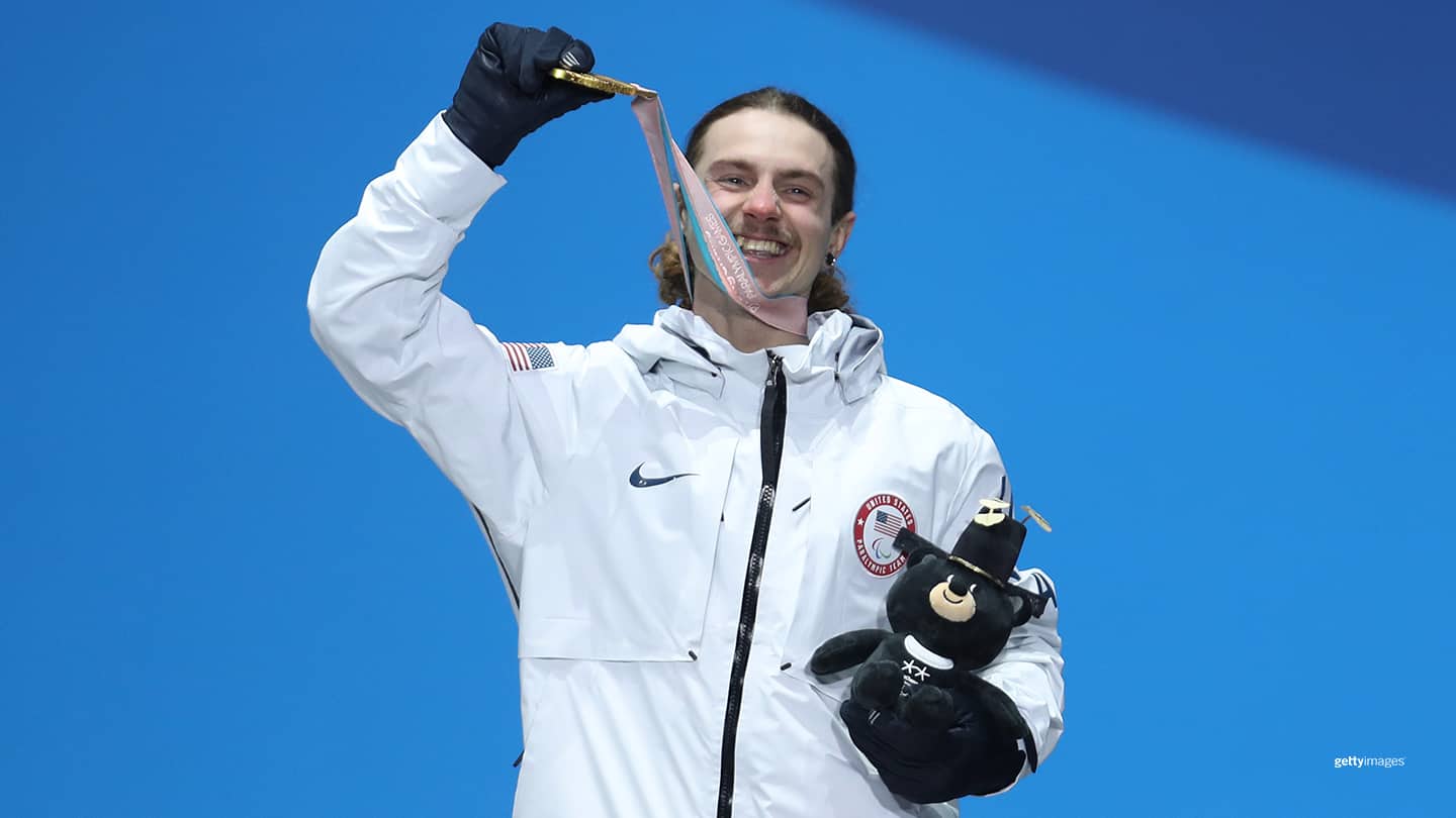 Noah Elliott celebrates during the medal ceremony for the Men's Snowboard Banked Slalom SB-LL1 Final on day seven of the Paralympic Winter Games PyeongChang 2018 on March 16, 2018 in Pyeongchang-gun, South Korea