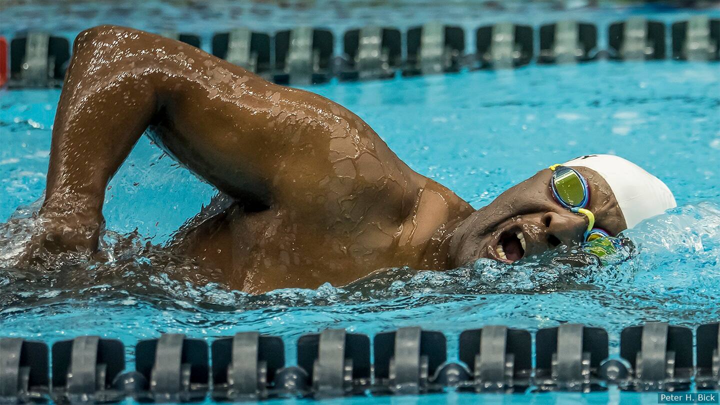 Curtis Lovejoy competes in a swimming competition. 
