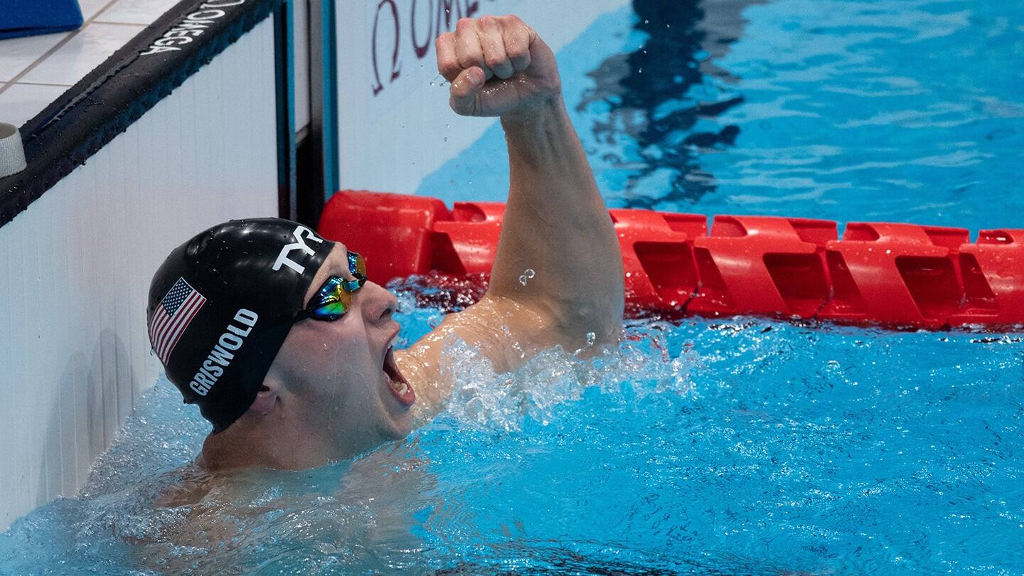 Robert Griswold celebrating after world record, gold medal race. 