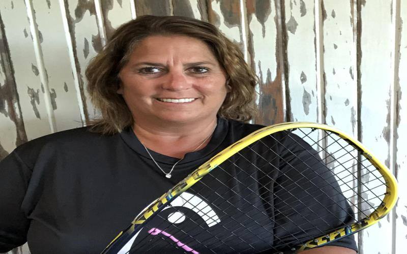 Carrie Reitmeier with racquet