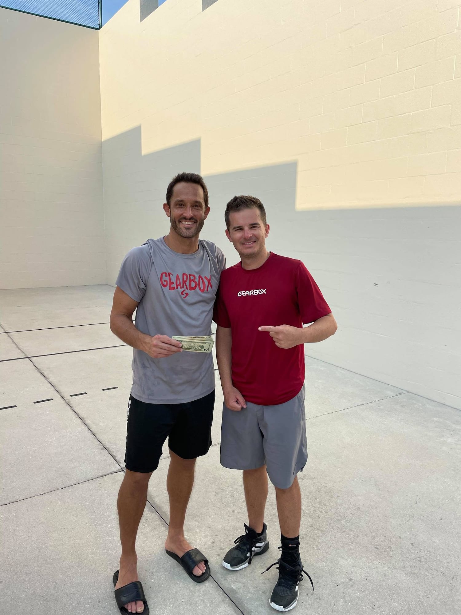 Figure 1: Pro winners Burns/Harmon showing off their prize money.  Photo courtesy of Rob Mijares 