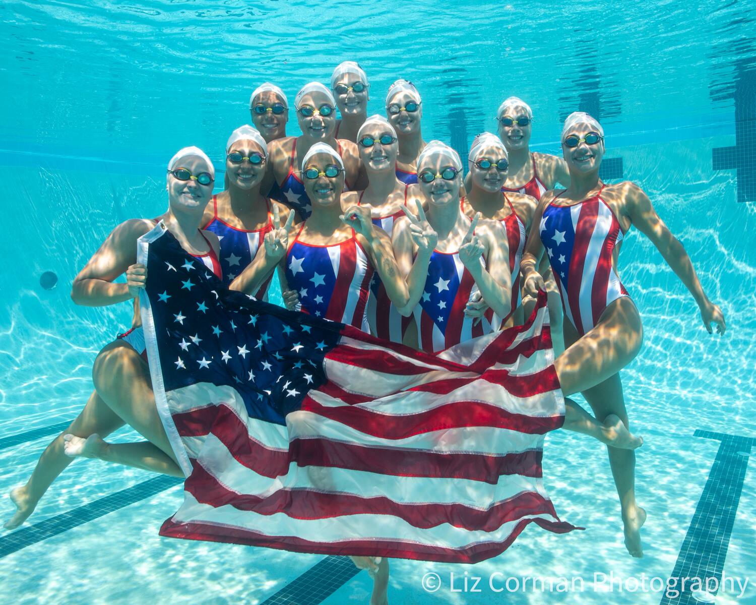 photo of Team USA with American Flag