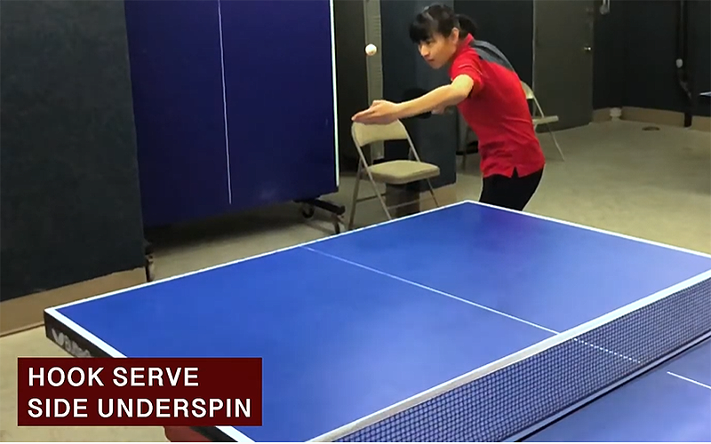 Shuang Wang demonstrates the hook serve