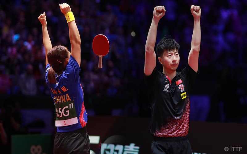 Liu & Ma celebrate match victory.