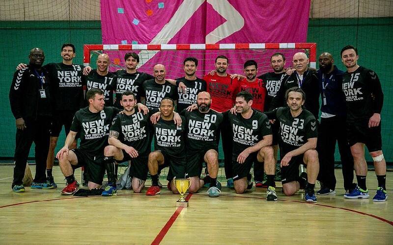 Players pose together during the NYC Super Globe tournament.