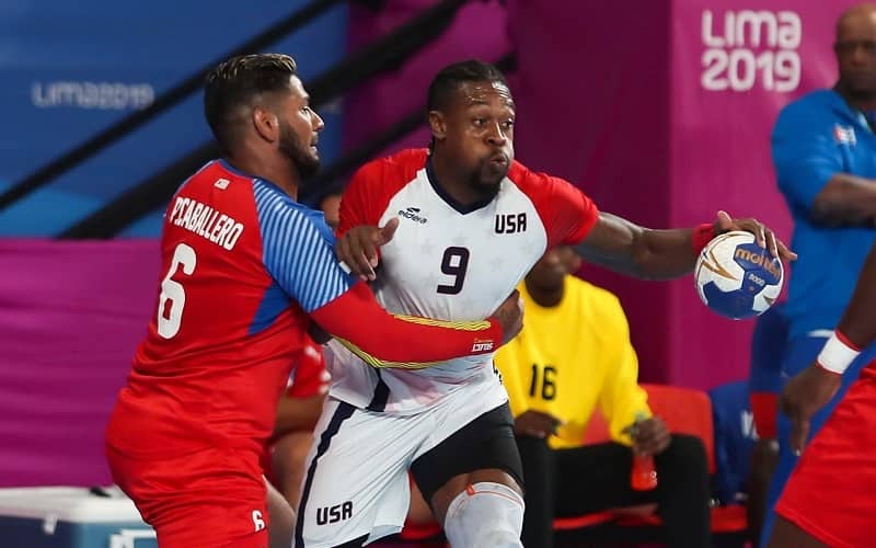 Gary Hines works around a Cuban defender in the 2019 Pan-American Games.