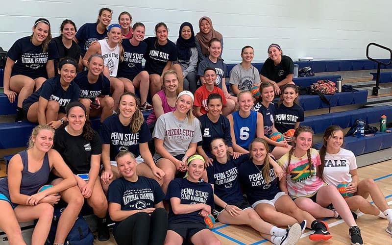Penn State Women's Handball Team athletes posing for a group photo
