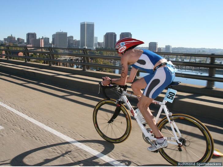 A duathlete crosses Lee Bridge in Richmond