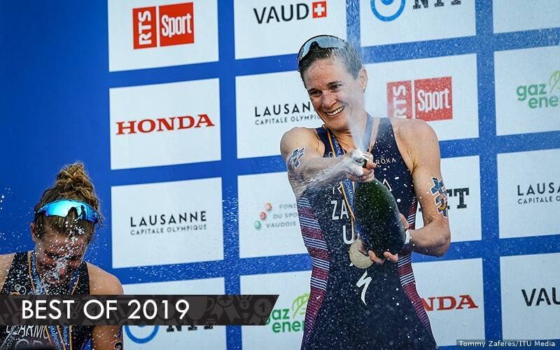 katie zaferes popping champagne on the podium