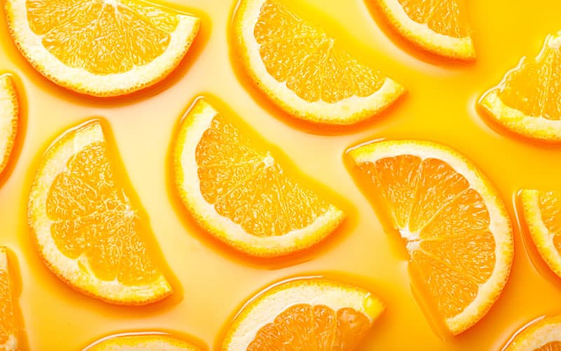 Oranges with orange background