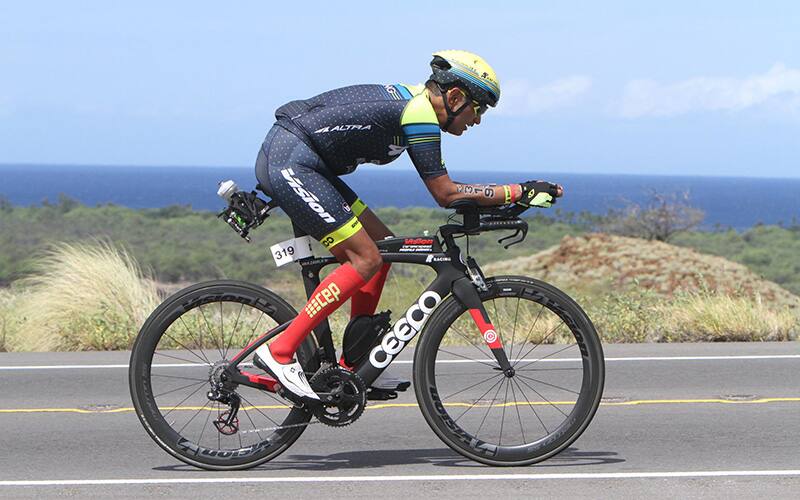 Rafael Zavala riding bike in Kona
