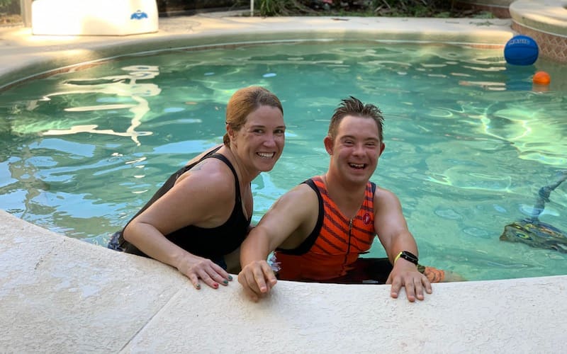 chris smiling in pool