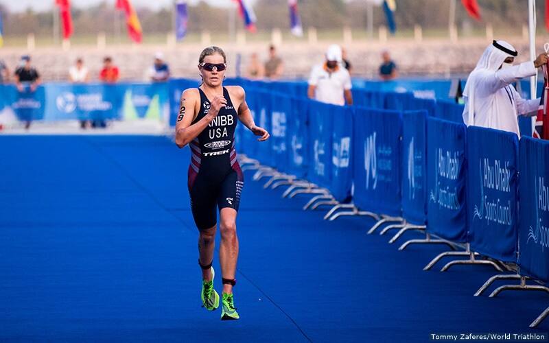 u.s. triathlete taylor knibb runs down the blue carpe