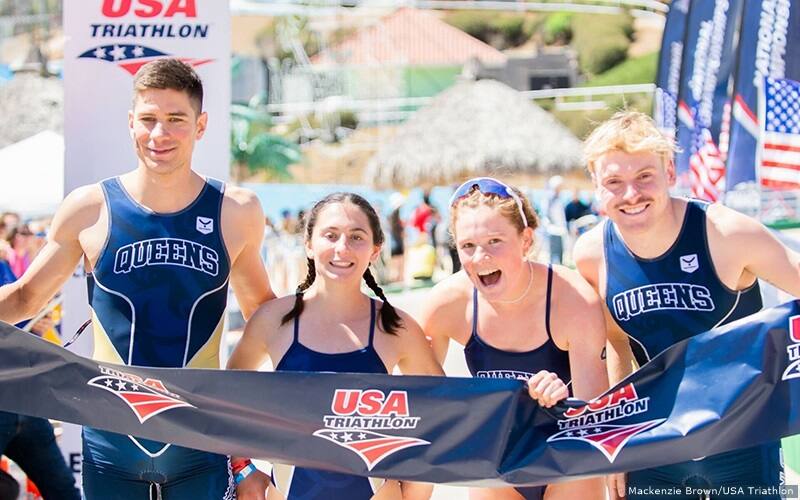 queens university of charlotte mixed relay team celebrates with finishers tape