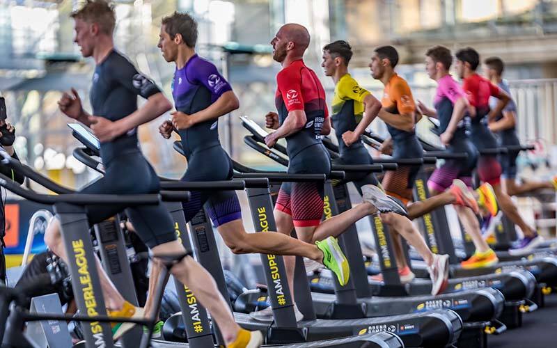 men racing on the treadmill in the arena games in Munich