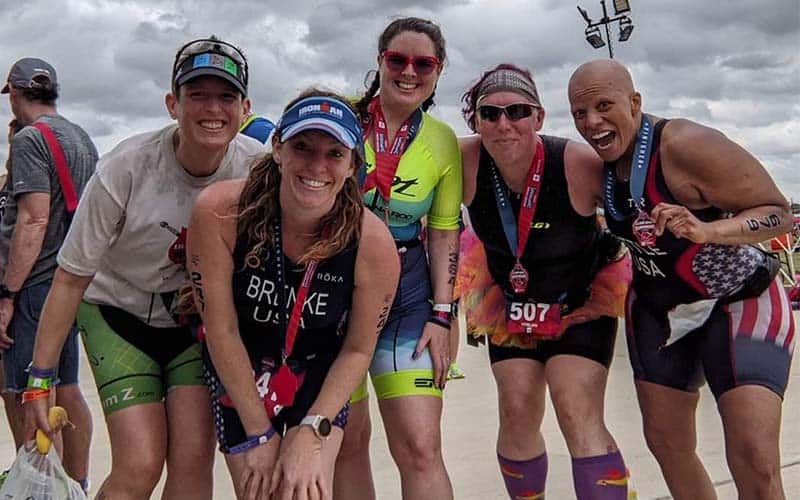 Leslie Battle poses for a photo with other Athena athletes