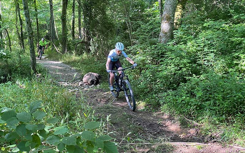 Rider in the woods at off road national championships in Arkansas