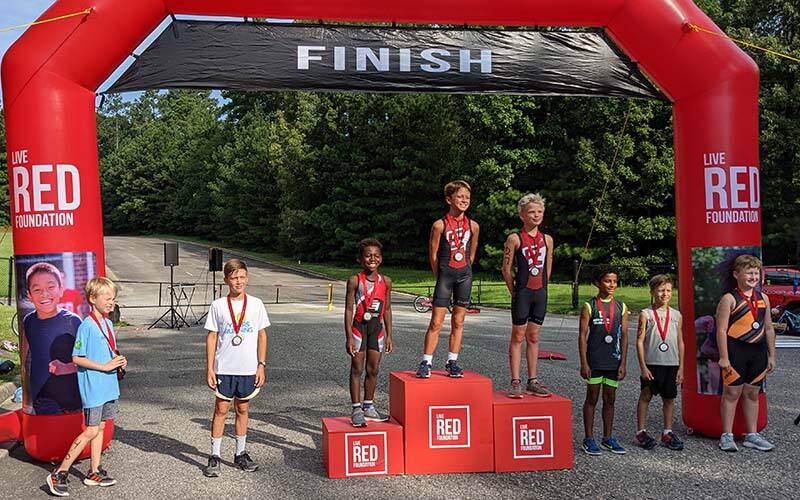 youth podium of the live red foundation