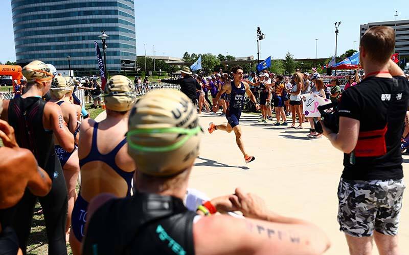 Brave Mays runs through a cheering crowd at Multisport Festival in Texas