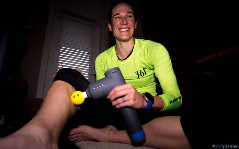 Athlete using massage device 