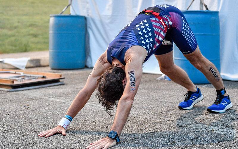 Male athlete stretching