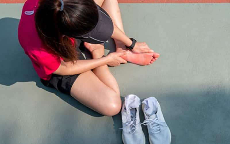 Athlete Rubbing Foot