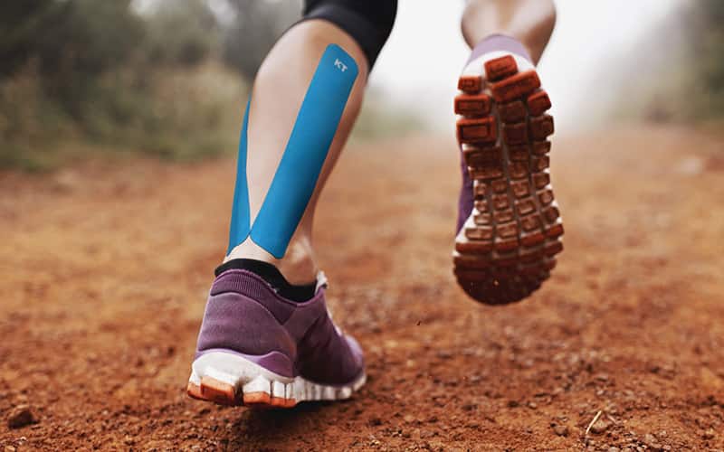 Athlete running in mud