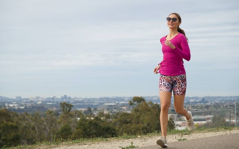 Woman Running Perspective Fitwear