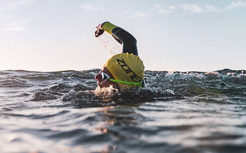 Athlete swimming in open water 