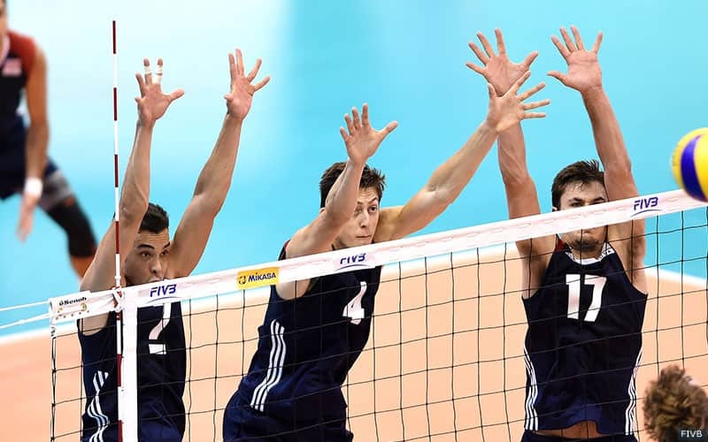 From left, Kawika Shoji, Jeff Jendryk and T.J. DeFalco block against Belgium