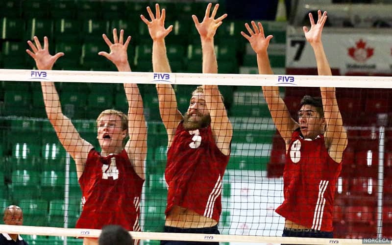 U.S. Men's Team players Kyle Ensing, Mitch Stahl and Brenden Sander block