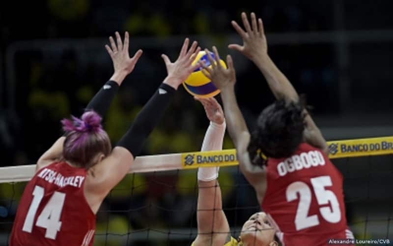 Michelle Bartsch-Hackley and Chiaka Ogbogu blocking against Brazil