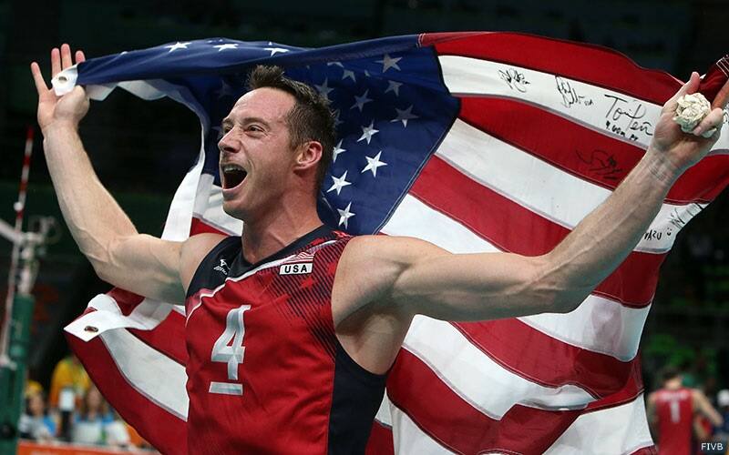 David Lee holds the U.S. flag at the 2016 Olympic Games