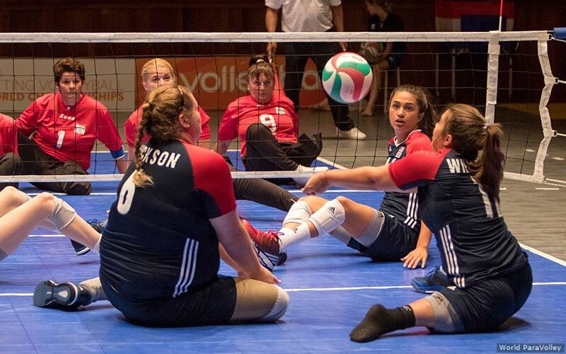 Women's Sitting Volleyball player Jillian Williams recieves