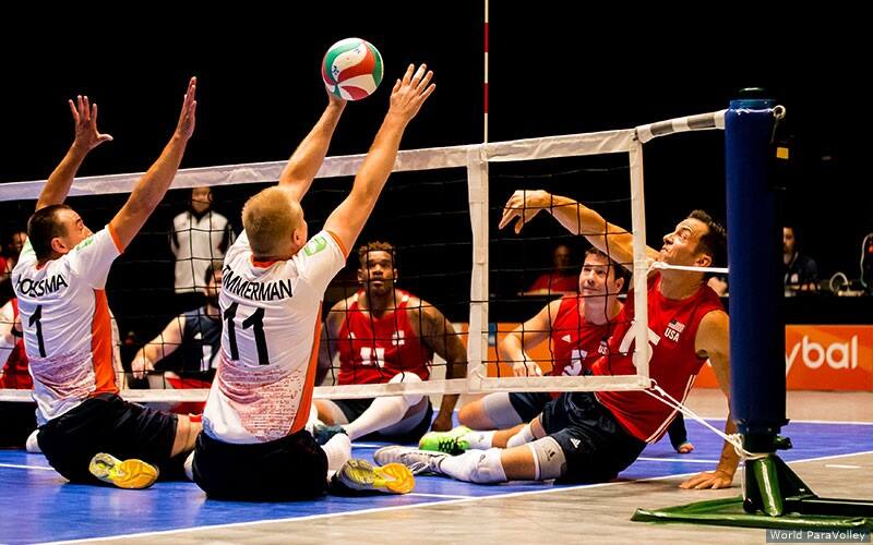 Chris Seilkop of the U.S. Men's Sitting Team attacks against Netherlands