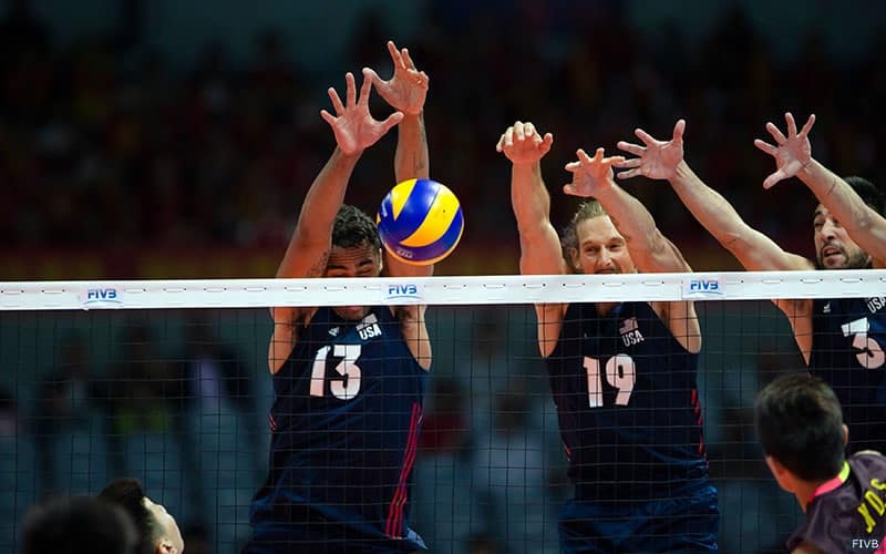 U.S. Men's volleyball players Ben Patch, Taylor Averill and Taylor Sander block against China