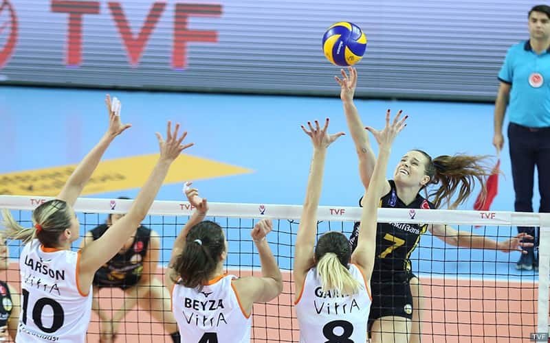 Kelsey Robinson attacking in the Turkish League finals with Jordan Larson blocking on the left
