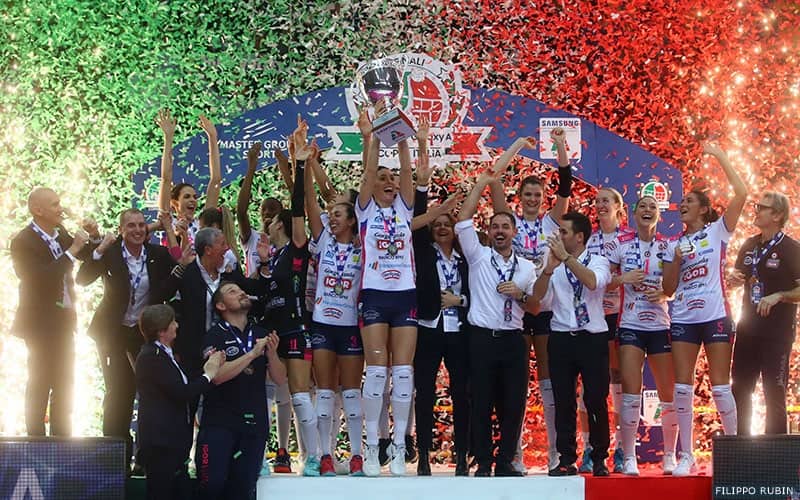 Michelle Bartsch-Hackley and Lauren Carlini on the podium after leading Novara to Italian Cup gold