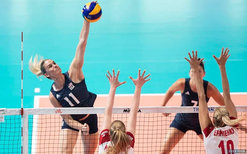 Annie Drews hits over the Poland block for one of her 23 points in Team USA's 3-1 win to open FIVB Volleyball Nations League Finals Round pool play