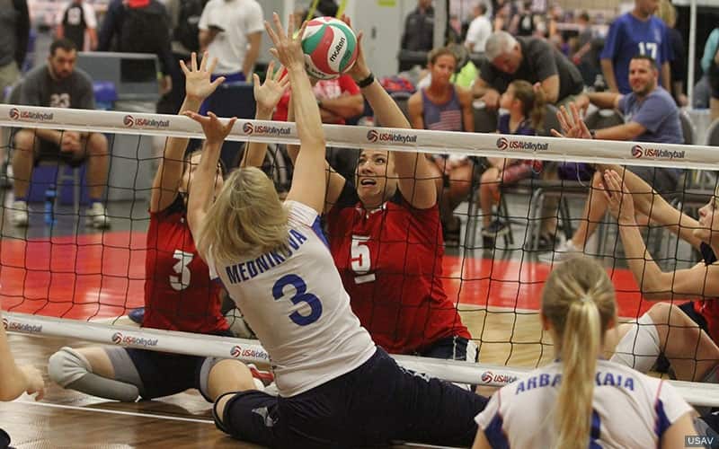 Katie Holloway blocking Russia during exhibition matches in May 2019
