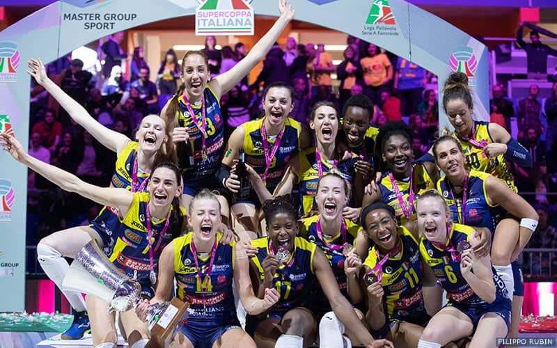 Kim Hill and Chiaka Ogbogu celebrating their pro club team Imoco Volley Conegliano winning the Italian Super Cup