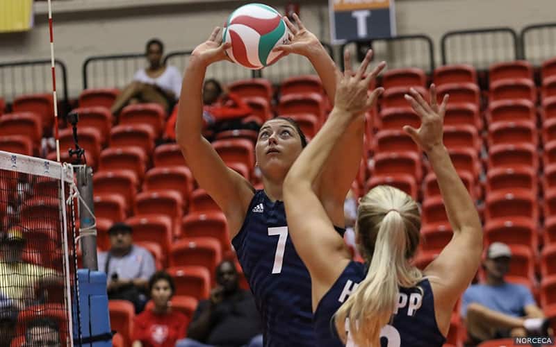 Lauren Carlini sets Hannah Tapp during a sweep over Trinidad & Tobago