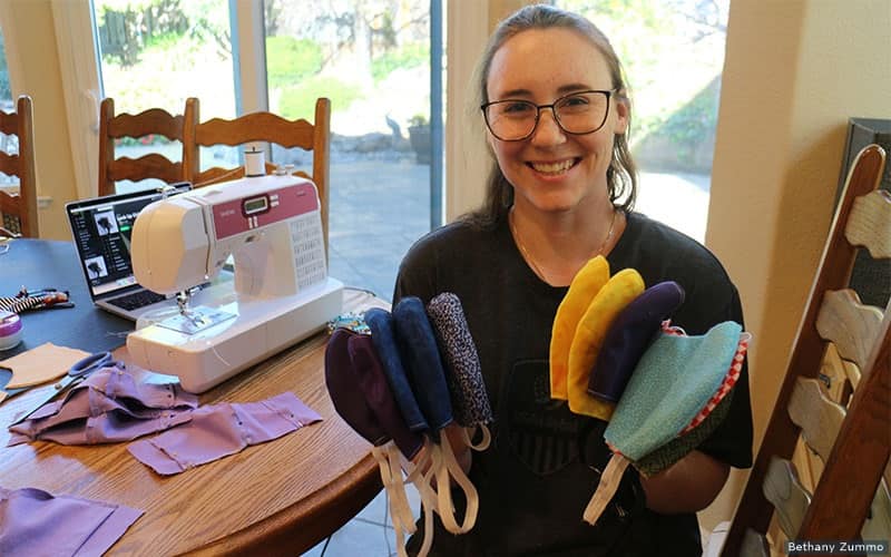 Bethany Zummo shows off some of the filtered masks she has sewn together and donating to local community in Dublin, California.