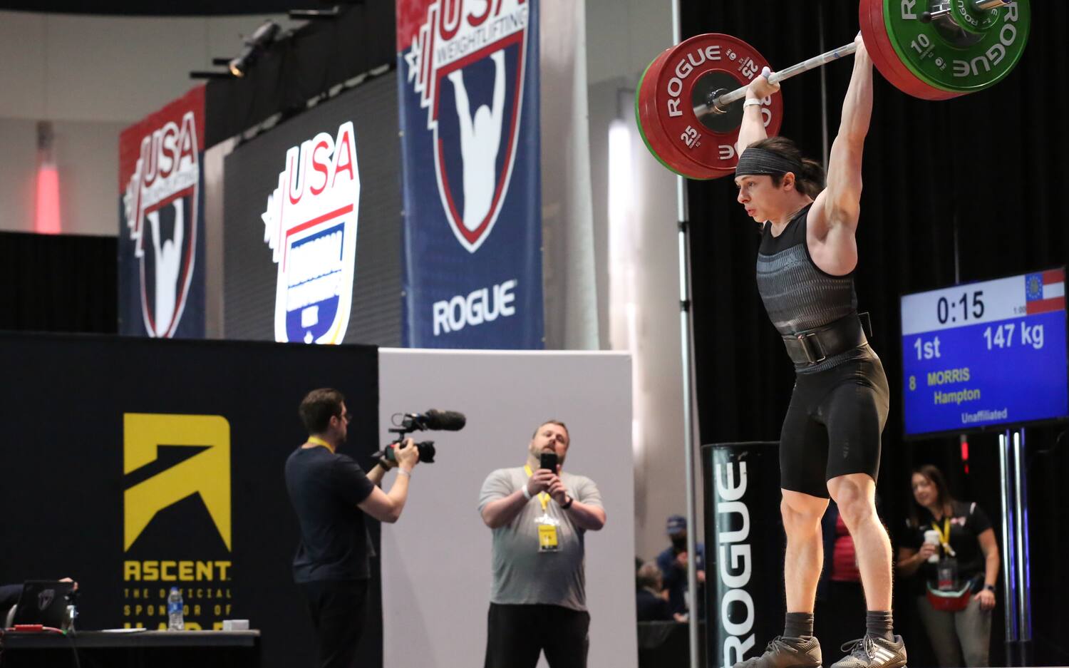 Hampton Morris completes a clean and jerk at Youth Nationals