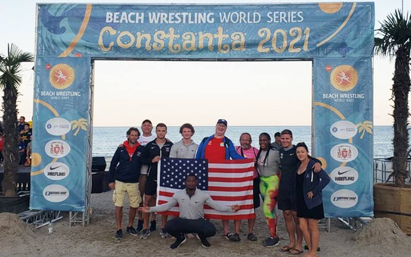 USA Senior Beach World Team delegation pose together on beach in Constanta, romania