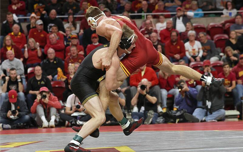 Nelson Brands wrestles against Iowa State on December 5, 2021