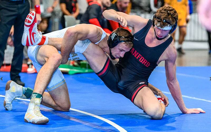 Evan Wick of Cal Poly secures a single leg on Shane Griffith of Stanford at Cliff Keen LV Invitational