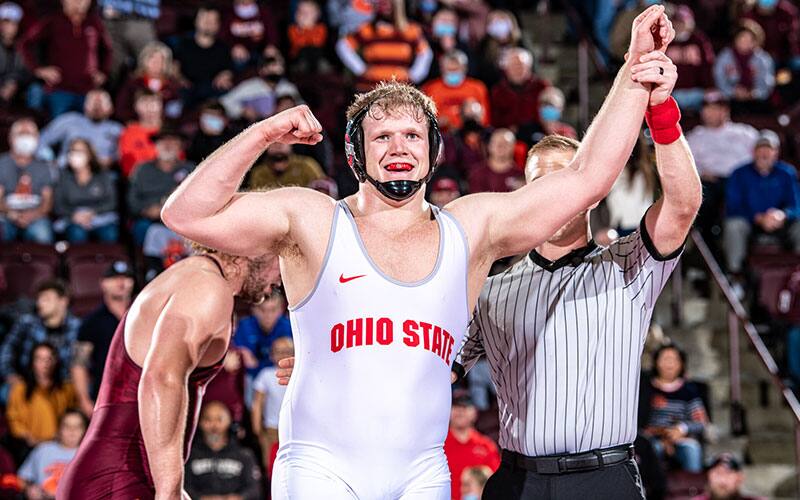 Tate Orndorff (Ohio State) has his arm raised in victory