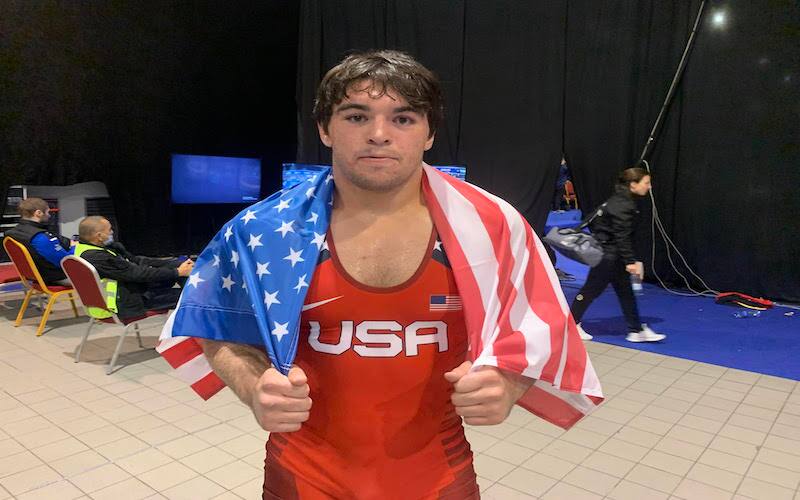 Tony Cassioppi poses with the American flag after winning gold